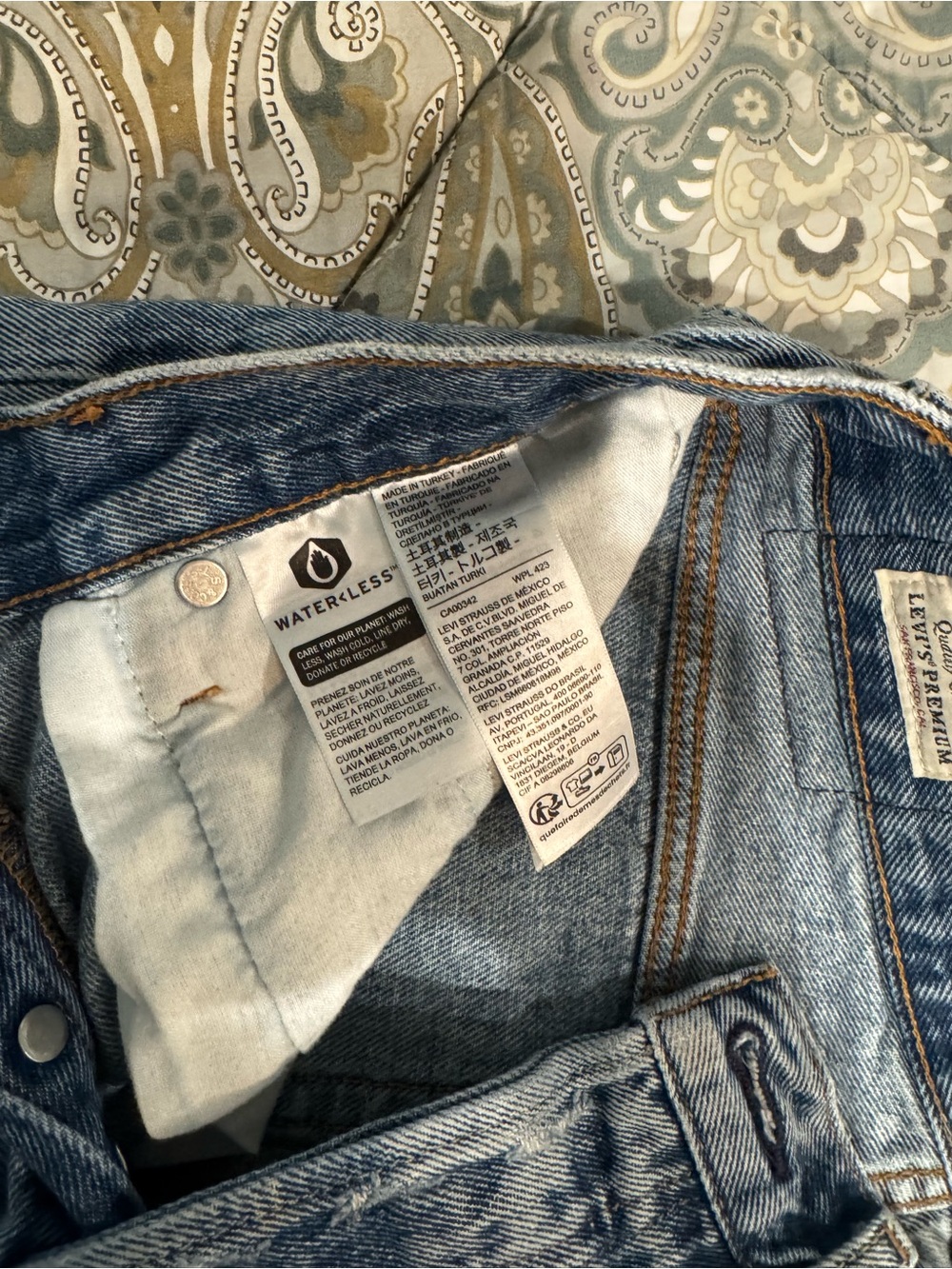 Levi's Distressed High-Rise Cutoff Denim Shorts - Light Blue Wash - Picture 5 of 5